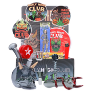 Front-facing arrangement of the “Dank & Dead” Smoking Box showing skull-themed glassware, stickers, and colorful packaging.