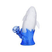 Front view of the Shark Attack Bong, a clear glass water pipe shaped like a shark’s head with a blue base.