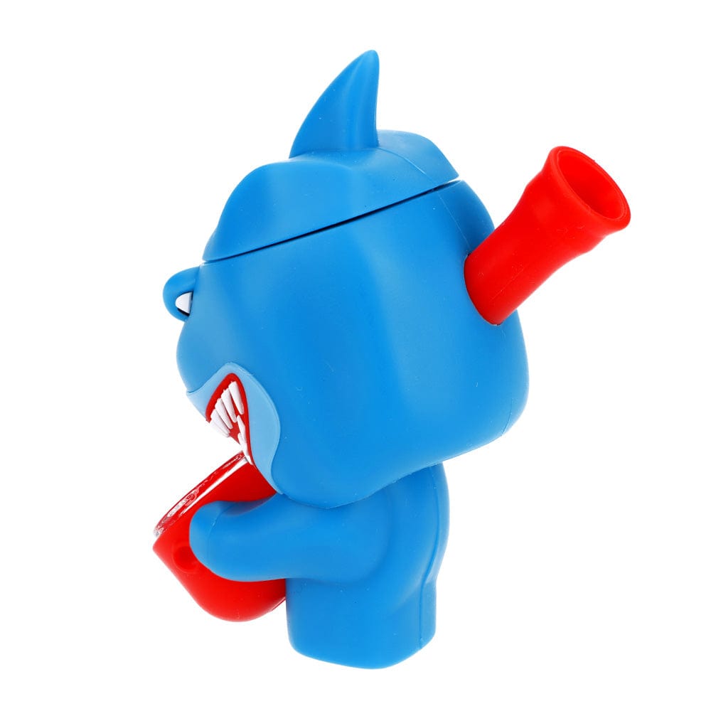 A side view of the Shark Silipipe, featuring a blue, sculpted design with a red mouthpiece extending from the main body.